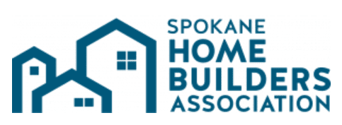 Logo of the Spokane Home Builders Association. It features the text "Spokane Home Builders Association" to the right of three stylized house icons in blue. The house icons, arranged vertically, represent different sizes, symbolizing various aspects of homebuilding.